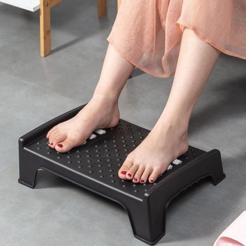 Foot rest for under desk with massage rollers